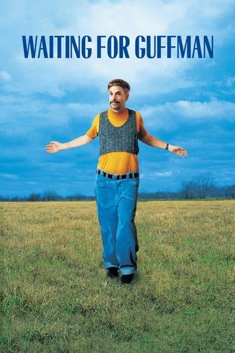 The poster features a man with a mustache and a mustache, standing in a field with arms outstretched. The sky is blue with clouds, and the grass is green. The mood is humorous and lighthearted.
