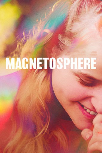A young woman with blonde hair smiles warmly in a vibrant, colorful background. The word "MAGNETOSPHERE" is prominently displayed in bold white letters. The image evokes a sense of wonder and creativity.