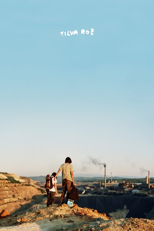 The poster features a serene outdoor scene with two figures standing on a rocky outcrop against a vast, clear blue sky. The warm tones of the earth and the soft lighting evoke a sense of peace and tranquility, while the distant smokestacks hint at industrial activity in the background. The minima...