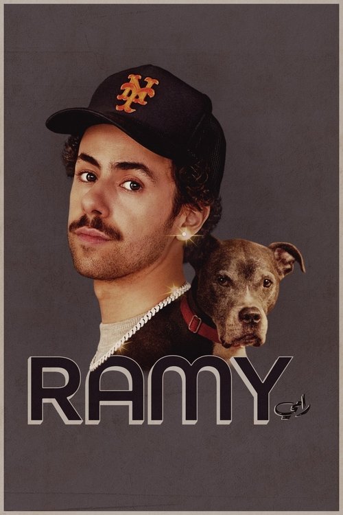 A man with a mustache and a dog wearing a New York Mets cap stand against a muted gray background. The poster features bold, metallic lettering spelling "RAMY" in the foreground. The mood is casual and humorous, suggesting a comedy or sketch show.