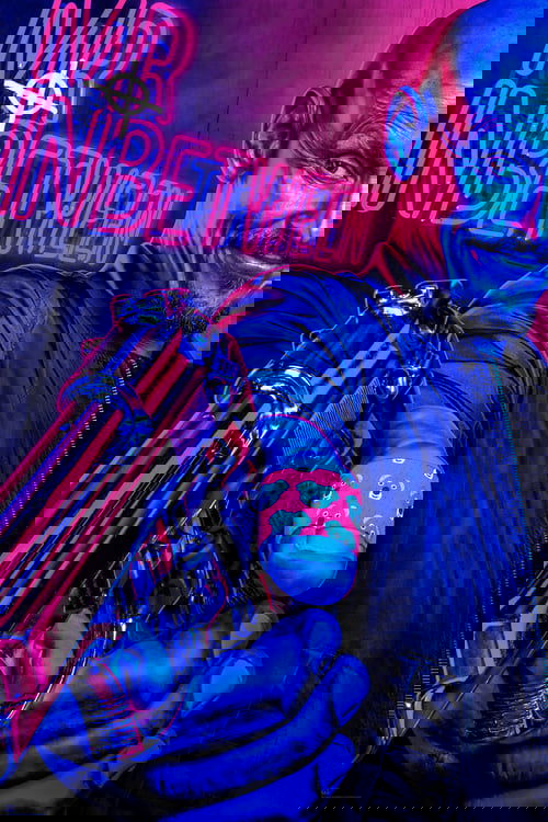 The poster features a muscular man with a glowing blue face and a pink wristband, holding a futuristic gun against a neon-lit background. The vibrant purple and blue hues create an intense, sci-fi atmosphere, emphasizing the show's action-packed and mysterious themes.