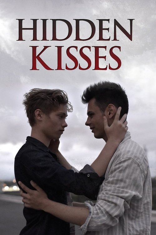 The poster features two men embracing against a moody, overcast sky. Their expressions convey deep emotion, with one hand gently resting on the other's cheek. The muted tones and dramatic lighting evoke a sense of intimacy and tension, hinting at a romantic drama.