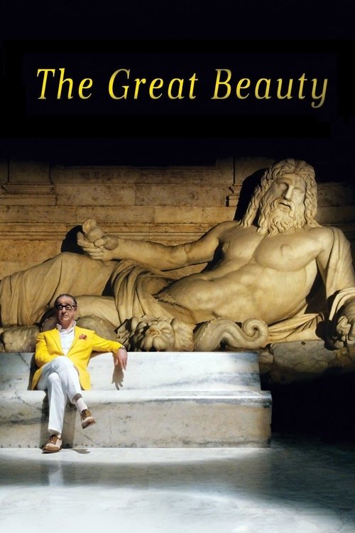 A man in a bright yellow shirt and white pants sits on a pedestal in front of a colossal statue of a reclining figure. The poster features warm lighting and earthy tones, evoking a sense of timeless elegance and mystery.