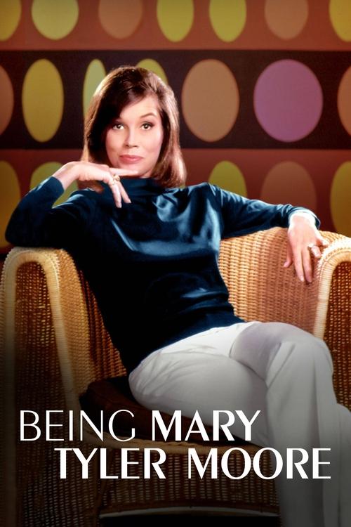 The poster features Mary Tyler Moore seated on a cozy, patterned armchair, exuding charm and warmth. The soft, warm tones of the background—rich browns, purples, and oranges—create a nostalgic and inviting atmosphere. The title and name are prominently displayed in bold white text, emphasizing th...
