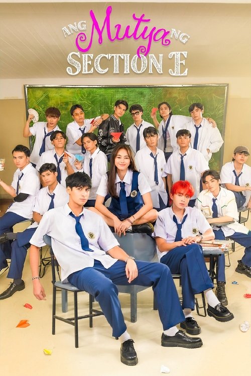 The poster features a group of young men in matching school uniforms, seated and standing in a classroom setting. The warm tones of their uniforms contrast with the bright green chalkboard behind them, creating a cheerful and youthful atmosphere. The mood is energetic and inviting, capturing the ...
