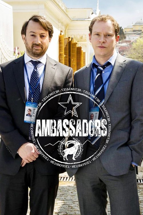Two men in suits stand confidently in front of a grand building, with a prominent "Ambassadors" logo featuring a star and a bird. The warm lighting and professional attire create a serious, diplomatic atmosphere.