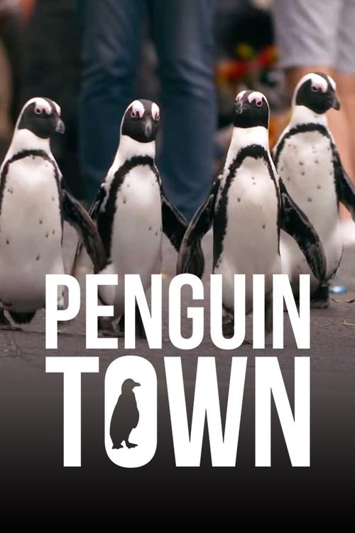 The poster features a group of penguins standing in a line, with the title "PENGUIN TOWN" prominently displayed in bold white letters. The background shows blurred figures of people, suggesting a lively social gathering. The overall mood is cheerful and inviting, capturing the essence of a fun an...