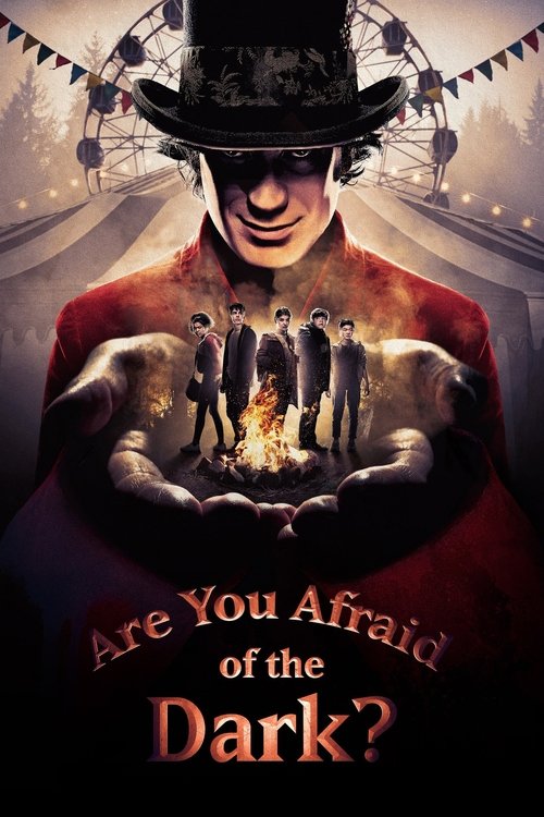 The poster features a mysterious man in a top hat, his face obscured by shadows, with a dark, ominous atmosphere. He holds a glowing orb of fire in his hands, surrounded by silhouettes of people in various poses. The colors are predominantly dark reds and blacks, creating a suspenseful and eerie ...