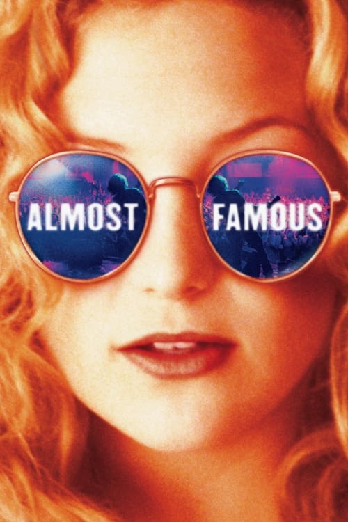 The poster features a glamorous woman with curly red hair, wearing oversized sunglasses that display the words "ALMOST FAMOUS" in bold white letters against a dark background. The warm orange tones and vibrant colors evoke a sense of excitement and nostalgia, capturing the essence of the film's l...