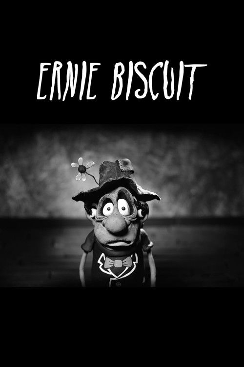 This black-and-white poster features a mysterious, ghostly figure of Ernie Biscuit with wide eyes and a mischievous grin. The dark, eerie background enhances the spooky mood, while the stark white text "ERNIE BISCUIT" stands out against the shadowy backdrop.