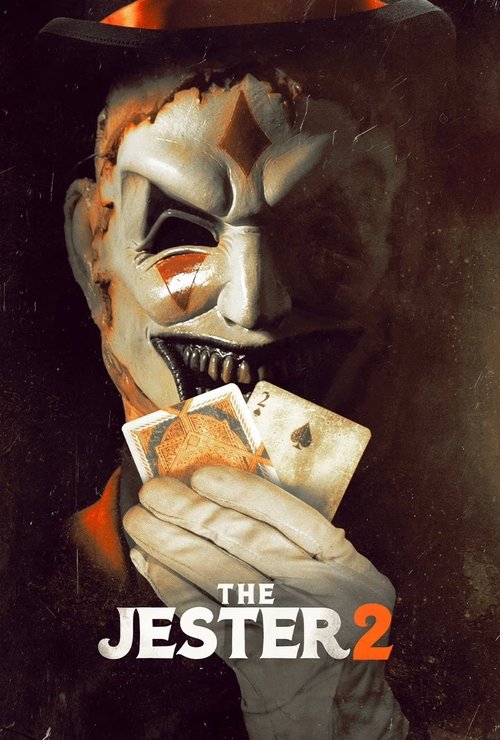 The Jester 2 poster features a menacing figure in a white mask with a sinister grin, holding cards in a dramatic pose. The dark, moody background enhances the eerie atmosphere, while the bold red and white text "THE JESTER 2" dominates the bottom, emphasizing the horror and suspense of the film.