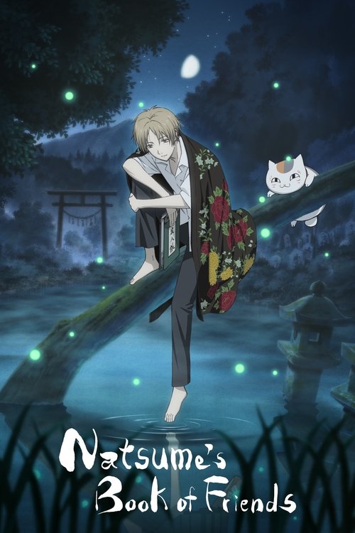 The poster depicts a serene night scene with a young man in traditional Japanese attire, holding a book while standing barefoot on a glowing tree branch. A white cat perches nearby, and a torii gate hints at a Japanese setting. The dark, starry sky with floating green lights enhances the mystical...