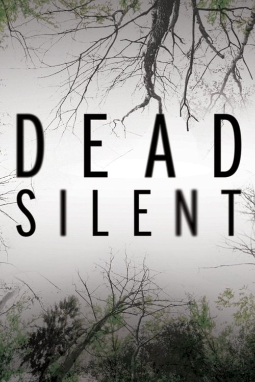 The poster features a hauntingly still scene with bare, skeletal branches reaching upward against a misty, gray backdrop. The title "DEAD SILENT" is prominently displayed in bold, black capital letters, evoking a sense of eerie mystery and impending doom. The muted color palette enhances the atmo...
