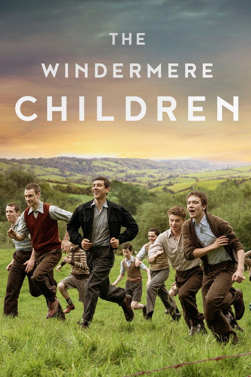 The poster captures a group of children running through a lush, green landscape under a dramatic sky. The warm colors of the sunset blend with the vibrant greens of the grass, creating a nostalgic and adventurous atmosphere.