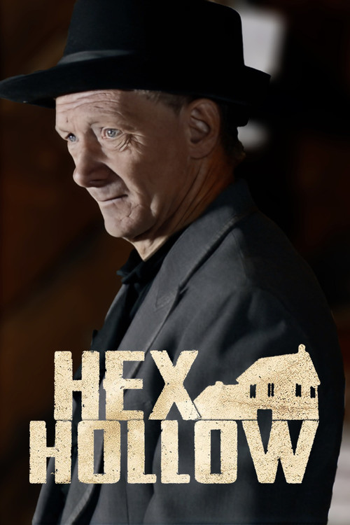 The poster features a man in a black hat and suit, exuding mystery and intrigue. The title "Hex Hollow" is prominently displayed in bold, golden letters, with a small illustration of a house nestled within the text. The warm, sepia-toned background adds to the eerie atmosphere, suggesting a dark ...