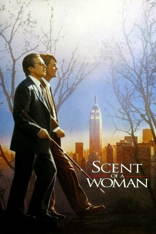 The poster features two men in dark suits walking side by side against a backdrop of a city skyline at sunset. The warm golden hues of the setting sun create a dramatic and romantic atmosphere. The title "SCENT OF A WOMAN" is elegantly displayed in white text at the bottom right.