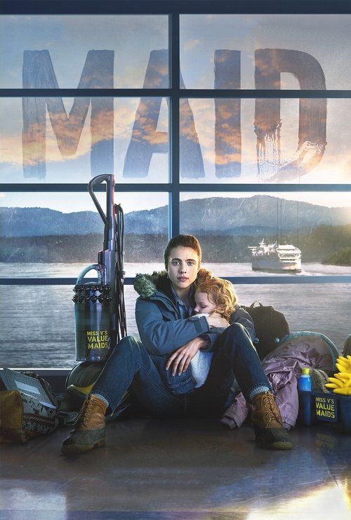A couple sits on a beach, embracing warmly against a backdrop of serene water and distant mountains. The poster features soft, warm tones with a large "MAID" text overlay, evoking a sense of peaceful travel and connection.