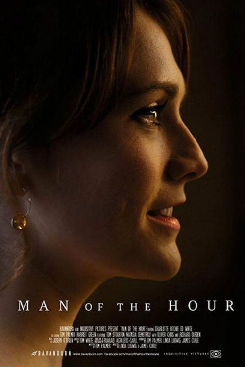 The poster features a woman in profile, her face illuminated by warm, golden light against a dark background. The mood is intimate and contemplative, evoking a sense of quiet reflection. The title "Man of the Hour" is elegantly displayed at the bottom, suggesting themes of time and personal signi...