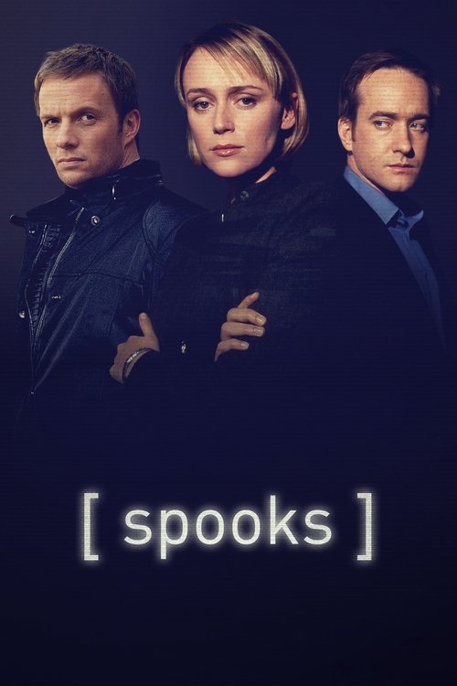 The poster features three men in dark, shadowy tones against a deep blue background. Their serious expressions and formal attire suggest a thriller or spy drama. The title "[spooks]" is prominently displayed in white text, emphasizing the show's genre and intrigue.