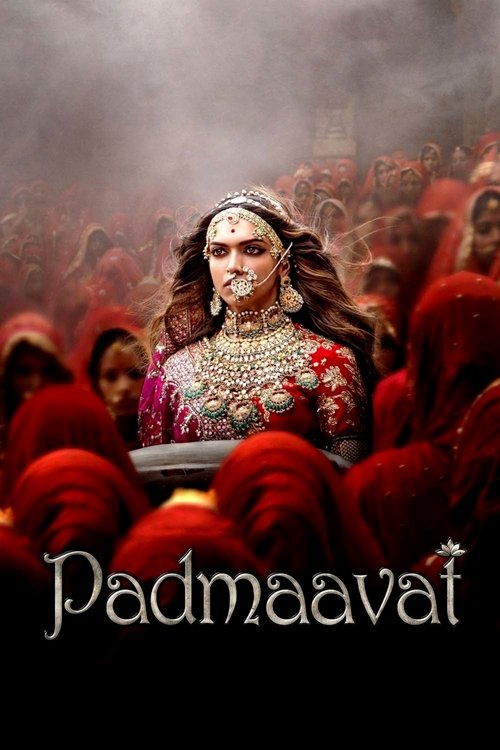 The poster features a regal figure in ornate red and gold attire, surrounded by a sea of red figures, evoking a sense of royal power and drama. The title "Padmaavat" is prominently displayed in elegant script, suggesting a historical or epic narrative. The overall composition conveys a powerful, ...