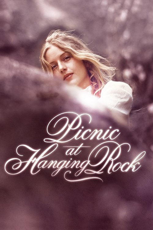 A young woman with blonde hair gazes thoughtfully against a dreamy purple backdrop, evoking a nostalgic, romantic mood. The title "Picnic at Hanging Rock" is elegantly written in white script, suggesting a classic, timeless story.