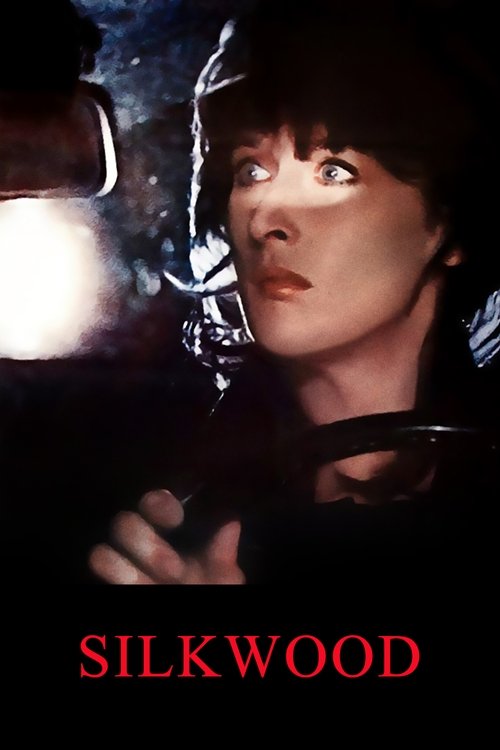 The poster features a woman with short dark hair, her face illuminated by a bright light against a dark background. She wears a helmet and holds a rifle, suggesting a tense or action-oriented scene. The title "SILKWOOD" appears in bold red letters at the bottom, conveying a mysterious and dramati...
