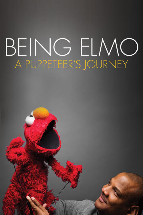 The poster features a vibrant red puppet Elmo against a dark gray background, with a smiling man in gray holding his hands. The text "Being Elmo: A Puppeteer's Journey" is prominently displayed at the top. The overall mood is warm and inviting, capturing the essence of the puppeteer's creative jo...