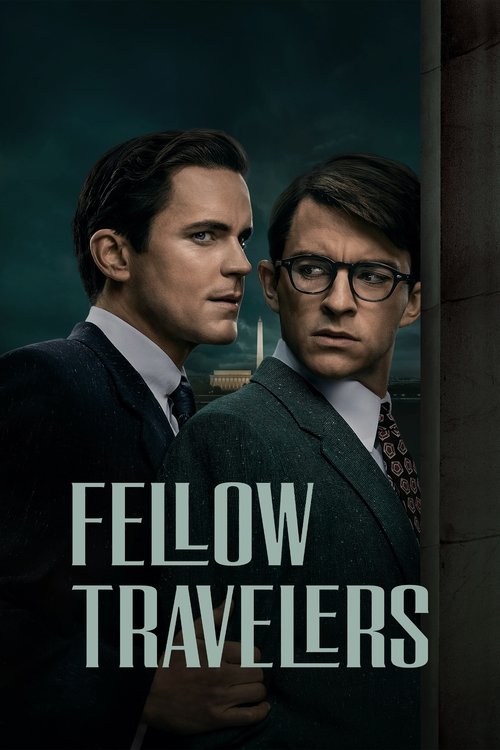 The poster features two men in formal suits against a moody, dark teal background, creating an air of mystery and intrigue. The muted color palette enhances the dramatic atmosphere, while the bold, white text "FELLOW TRAVELERS" anchors the composition.