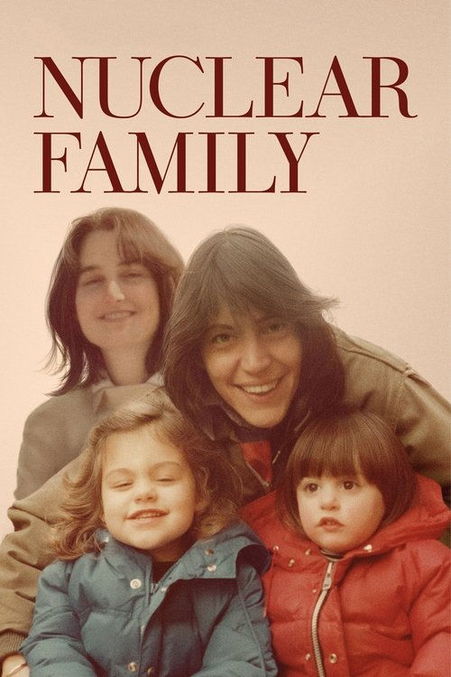 The poster features a warm, sepia-toned image of a nuclear family—two adults and two children—smiling warmly against a soft beige background. The muted tones evoke a nostalgic, intimate mood, capturing the essence of a traditional family unit in a cozy, everyday setting.