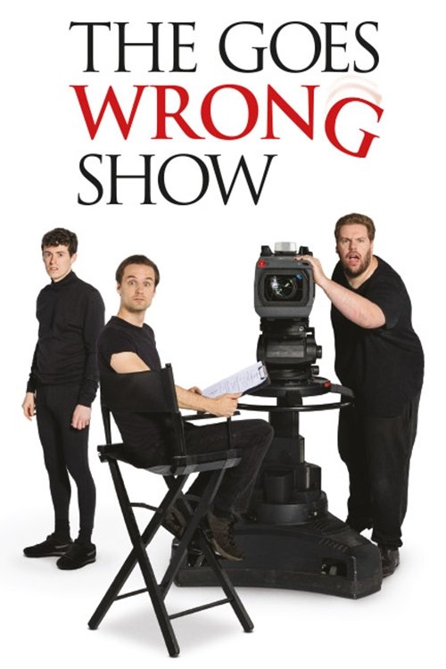 The poster features four men in formal attire against a stark white background. The title "THE GOES WRONG SHOW" is prominently displayed in bold red and black text. The mood is humorous and dramatic, suggesting a comedy sketch show with a serious tone.