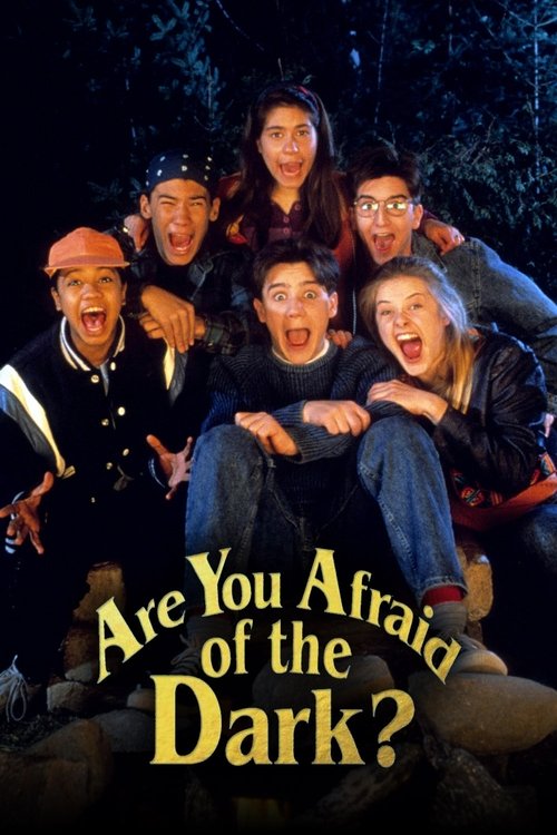 The poster features five characters in a dark, nighttime setting, creating a mysterious and suspenseful mood. The characters' expressions convey fear and excitement, with wide eyes and open mouths suggesting intense emotion. The title "Are You Afraid of the Dark?" is prominently displayed in bold...