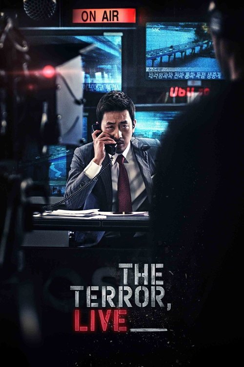 The poster features a man in a suit holding a phone to his ear, set against a backdrop of dimly lit screens displaying what appears to be a news broadcast. The dark tones and cool blues create a suspenseful atmosphere, while the bold red and white text emphasizes the title "The Terror Live."