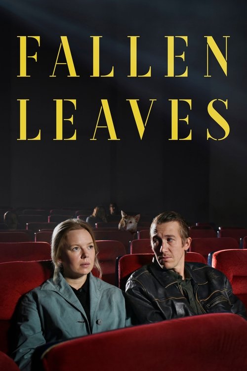 The poster features two characters in red theater seats, one with blonde hair and the other with dark hair, both looking forward with serious expressions. The title "FALLEN LEAVES" is prominently displayed in bold yellow letters against a dark background, evoking a somber and reflective mood.