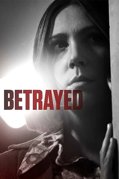 The poster features a hauntingly beautiful woman with a somber expression, her face partially obscured by a shadowy figure. The title "BETRAYED" is prominently displayed in bold red letters, creating a stark contrast against the muted tones of the image. The overall mood is one of mystery and sus...