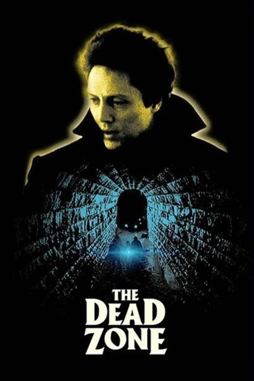 The poster features a man in a dark coat against a black background, with a glowing blue figure emerging from behind him. The title "The Dead Zone" is prominently displayed at the bottom in bold white letters. The overall mood is mysterious and suspenseful, evoking a sense of danger and intrigue.