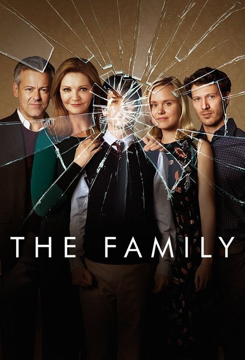 The poster features four characters standing against a dark background with a shattered glass effect, symbolizing conflict or uncertainty. The warm tones of their clothing contrast with the cool, cracked colors around them. The title "THE FAMILY" is prominently displayed in bold white letters at ...