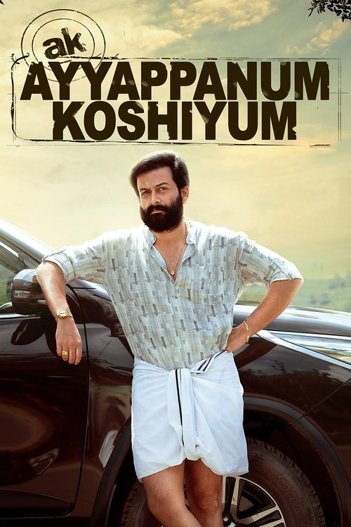 The poster features a rugged man with a beard and mustache, exuding confidence in a light blue shirt and denim shorts. He leans casually against a dark car, with a warm sunset backdrop. The bold title "Ayyappanum Koshiyum" dominates the top, suggesting a blend of humor and adventure. The overall ...