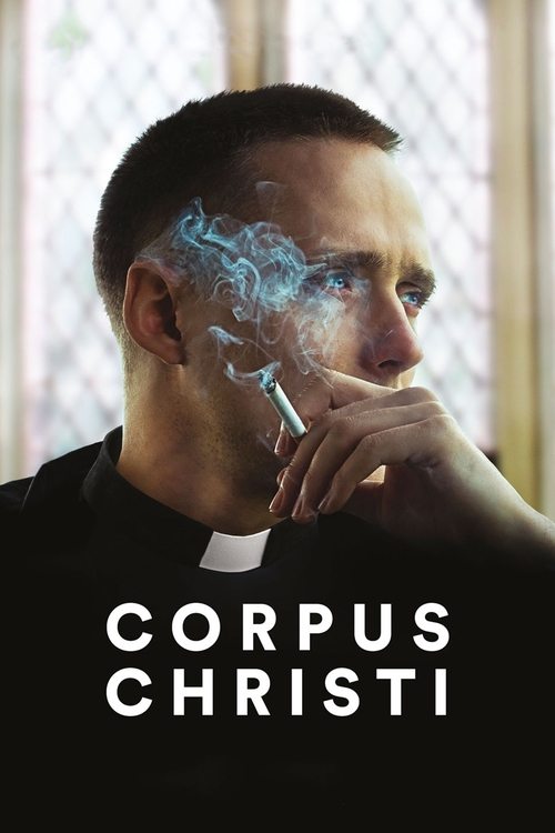 The poster features a contemplative man in a black robe with a white clerical collar, his face illuminated by a mysterious blue aura that seems to emanate from his forehead. The mood is serene yet mysterious, suggesting themes of spirituality and introspection. The title "Corpus Christi" is promi...