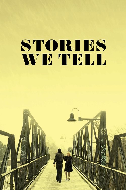 The poster features a lone couple walking away from the viewer on a bridge under a hazy, sepia-toned sky. The title "STORIES WE TELL" is prominently displayed at the top in bold, black letters. The mood is mysterious and nostalgic, evoking a sense of longing and memory.