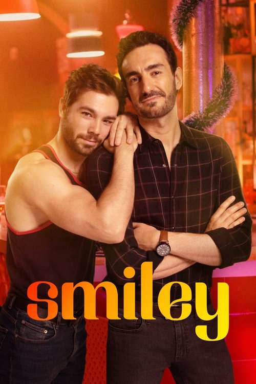 This TV show poster features two men in a vibrant, warm-toned setting that exudes a playful and energetic mood. The man on the left, wearing a sleeveless top, leans affectionately against the man on the right, who sports a plaid shirt and a watch. The bold, colorful text "smiley" anchors the imag...