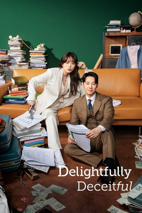 The poster features a couple in a cozy, cluttered room with stacks of books and scattered papers, evoking a sense of everyday life and humor. The warm tones of the furniture and the casual attire of the characters create a relaxed atmosphere. The title "Delightfully Deceitful" is prominently disp...