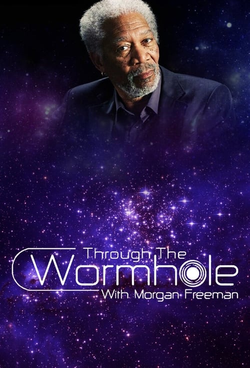 The poster features a contemplative man in a dark suit against a cosmic backdrop of swirling purple and blue nebulae. The title "Through the Wormhole" is elegantly displayed in a glowing white font, evoking mystery and wonder. The overall mood is one of introspection and exploration into the unkn...