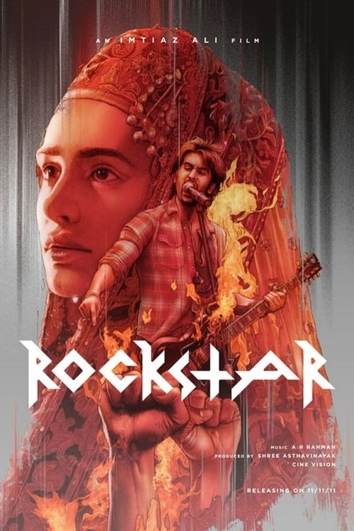 The poster features a striking portrait of a woman with fiery red hair, surrounded by dramatic flames and glowing embers. A young man in a golden outfit stands behind her, holding a guitar, suggesting a musical theme. The title "ROCKSTAR" is boldly displayed in white letters, with the tagline "TH...