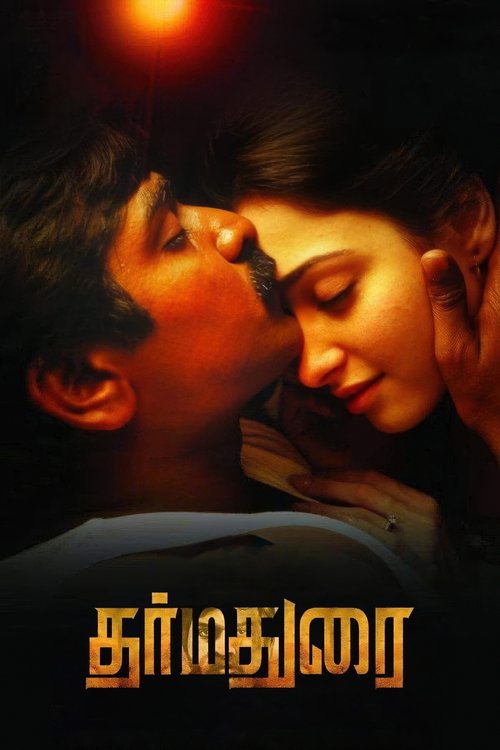 The poster features a tender moment between two characters, with warm orange lighting casting a romantic glow. The title "Dharmadurai" is prominently displayed in bold, golden lettering at the bottom, emphasizing the film's title. The overall mood is intimate and evocative of a classic romantic d...