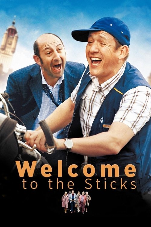 The poster features two men laughing joyfully, one in a blue vest and cap, the other in a suit. The warm orange text "Welcome to the Sticks" stands out against the blue sky. The overall mood is lighthearted and fun, capturing the essence of the comedy.