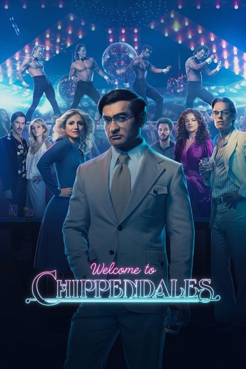 The poster features a man in a gray suit standing prominently in the foreground, surrounded by a diverse group of people dressed in colorful costumes. The background is filled with vibrant stage lights and performers, creating an energetic and lively atmosphere. The overall mood is one of excitem...