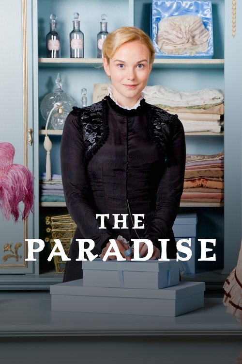 A woman in a black dress stands before shelves filled with neatly folded clothes, evoking a cozy, timeless atmosphere. The title "The Paradise" is prominently displayed in elegant white lettering, suggesting an idyllic escape.