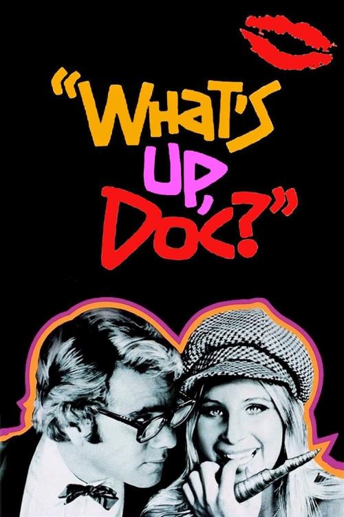 The poster features a black background with vibrant red lips at the top, followed by the title "What's Up, Doc?" in bold, colorful letters. Below, two men are shown in a heart-shaped frame, one wearing glasses and a bow tie, the other in a beanie and smoking. The overall mood is playful and nosta...