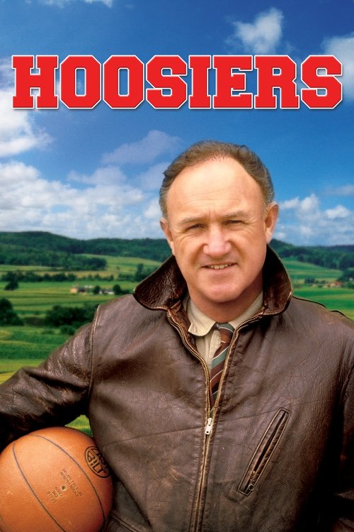 The poster features a smiling man in a brown jacket holding a basketball against a backdrop of rolling green hills under a bright blue sky. The bold red title "HOOSIERS" dominates the top, evoking a sense of nostalgia and adventure.