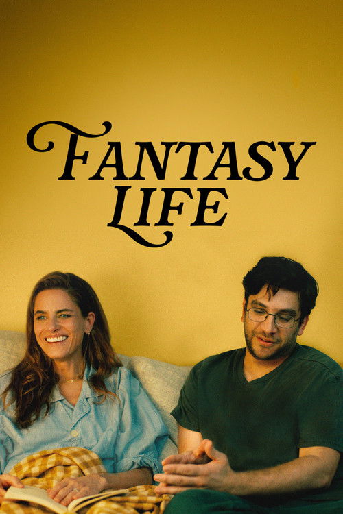 The poster features a warm, golden-yellow background with the title "Fantasy Life" in elegant, cursive black lettering. A woman in a light blue shirt and a man in a dark green shirt sit side by side, smiling warmly at the viewer. Their relaxed posture and cheerful expressions convey a sense of co...